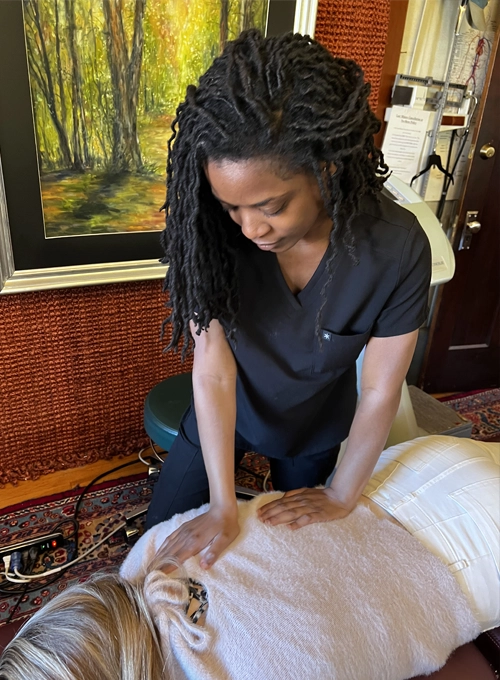 Massage Therapy Little Rock AR Keambria Warren Massaging Woman